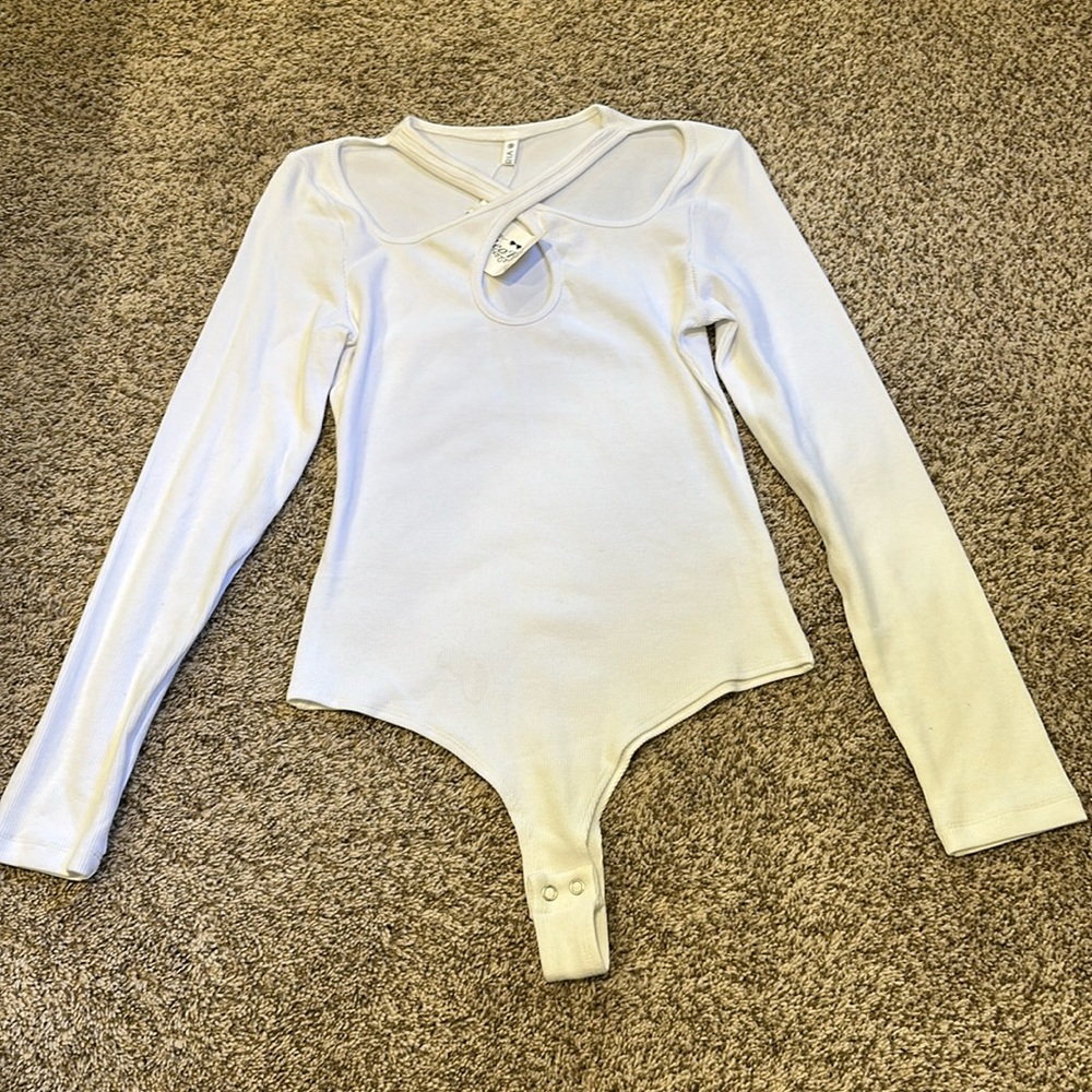Long sleeve white cross neck thong bodysuit